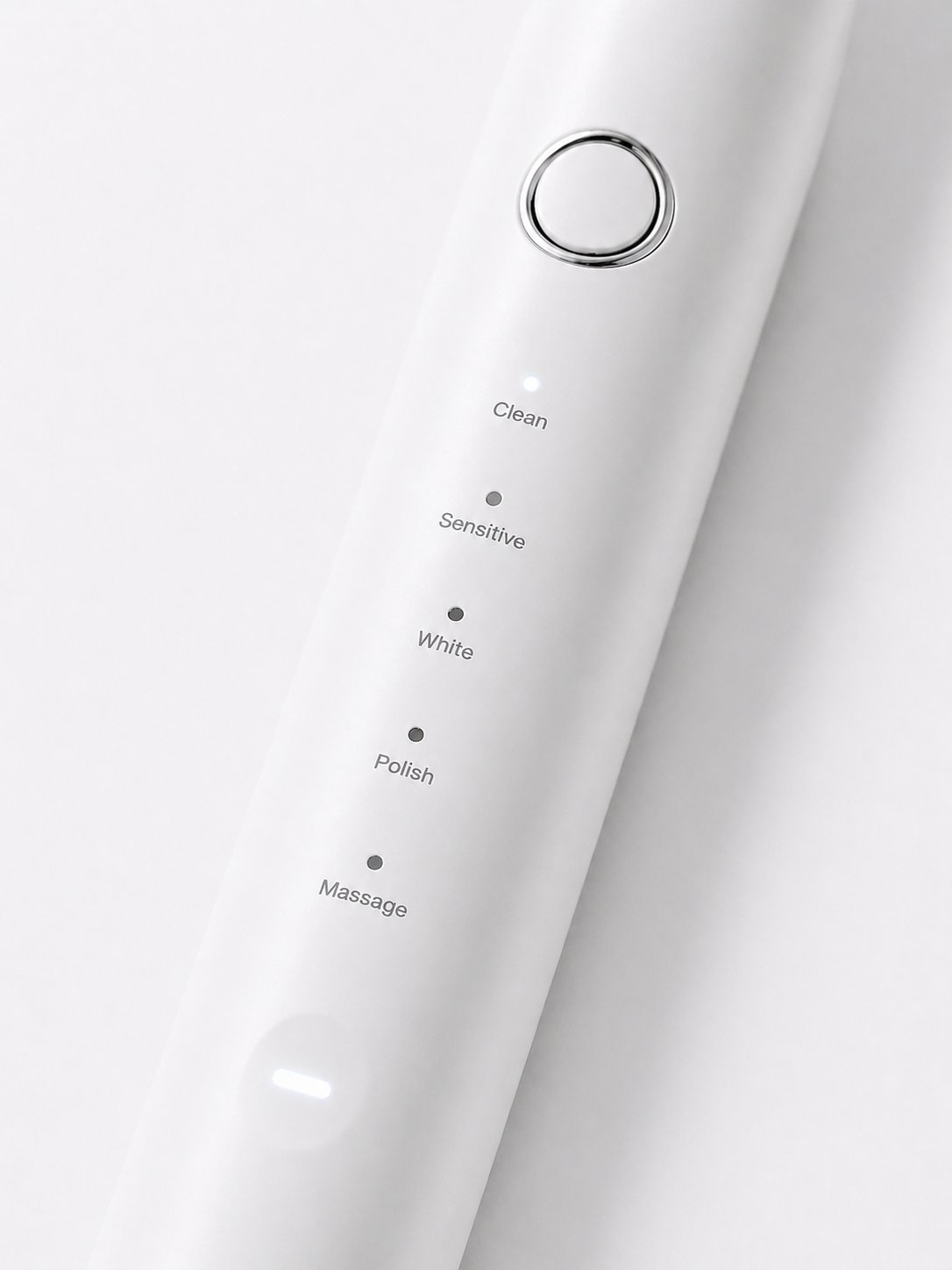 Snosha N2 white electric toothbrush showing 5 cleaning modes: Clean, Sensitive, White, Polish, Massage