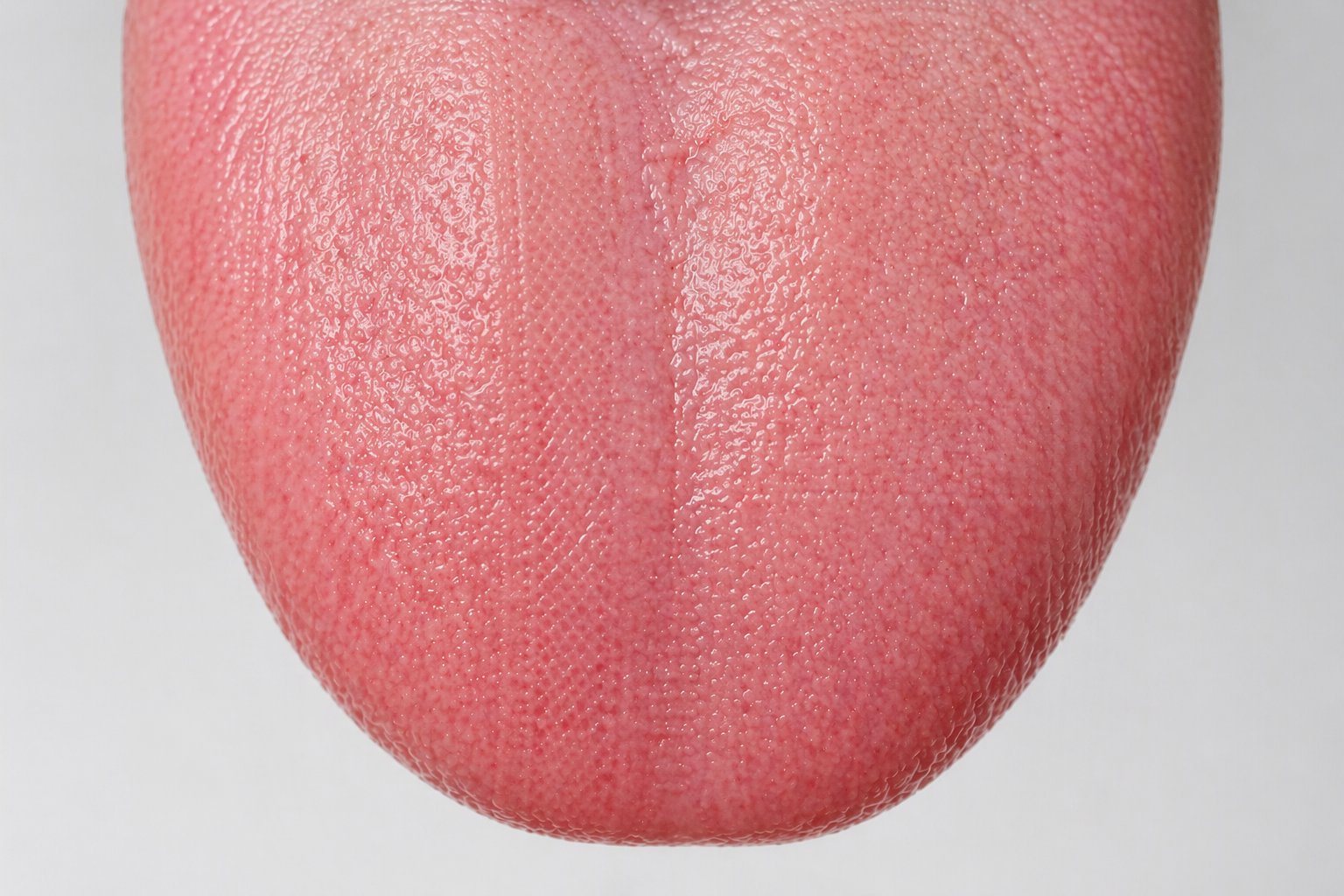 Clean healthy tongue after using Snoshax tongue scraper removes coating and bacteria