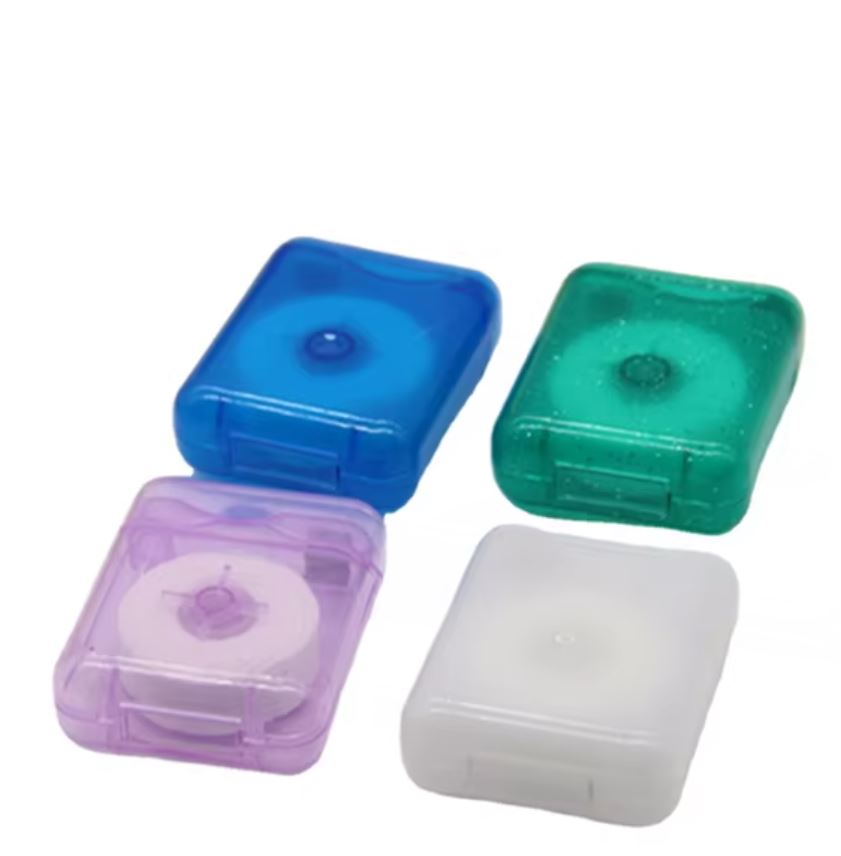 snosha-dental-floss-4-color-compact-cases-blue-green-purple-white.jpg