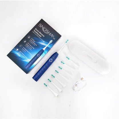 Snosha N2 blue electric toothbrush full kit contents laid out with packaging