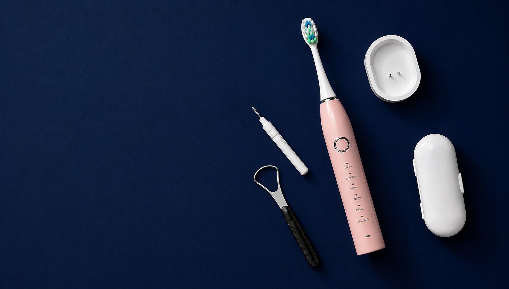 Snosha N2 pink toothbrush, tongue scraper, travel case and charging stand on dark navy background